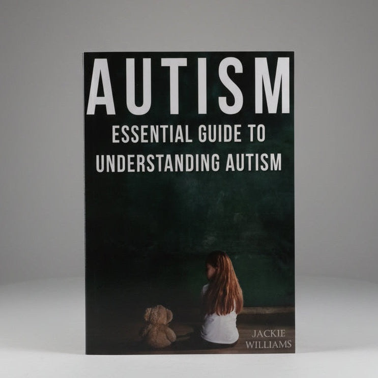 The front cover of the book 'Autism: Essential Guide to Understanding Autism' by Jackie Williams, featuring a dark, moody illustration of a young girl with long light brown hair sitting next to a teddy bear in front of a dark green background.
